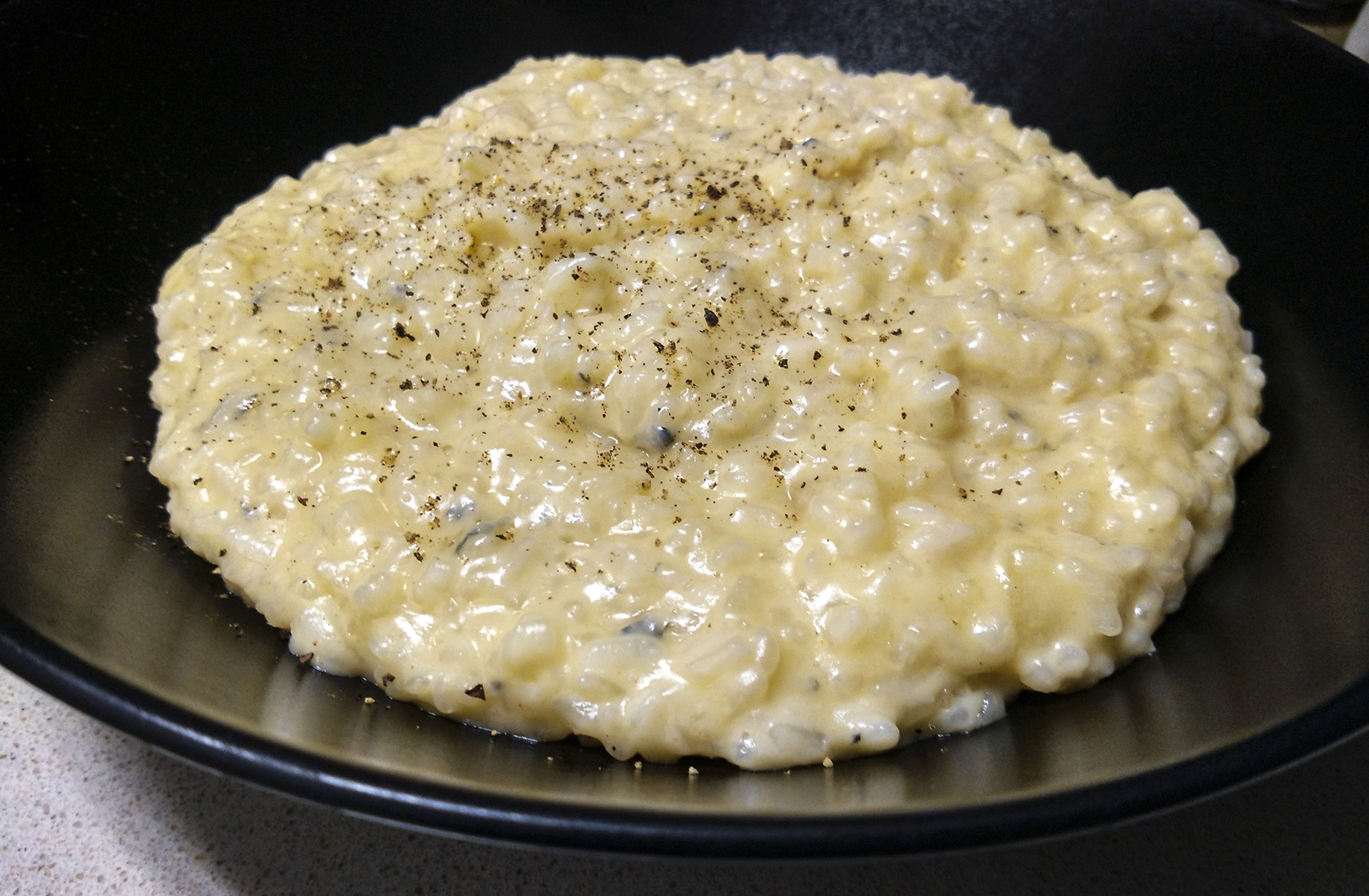 Risotto alla Crema di Parmigiano Reggiano e funghi Porcini Cascina